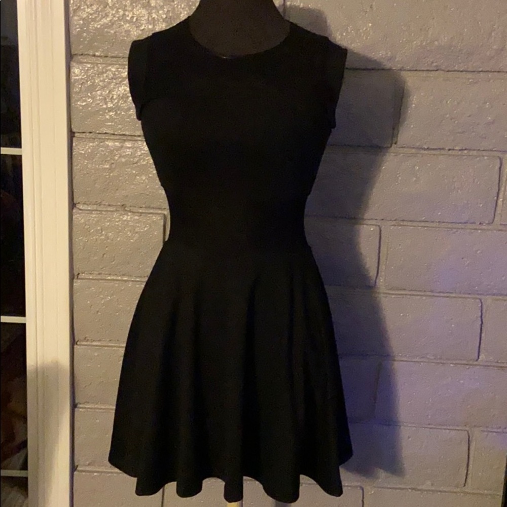 Black dress with mesh panels